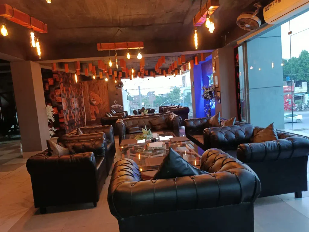 Eat N Go Restaurant Sheikhupura: An Honest First-Hand Review, Beef Burger Breakdown, and Complete Visitor Guide Interior dining room layout and clean seating environment of Eat N Go Restaurant Sheikhupura on Sheshal Mahal Road.